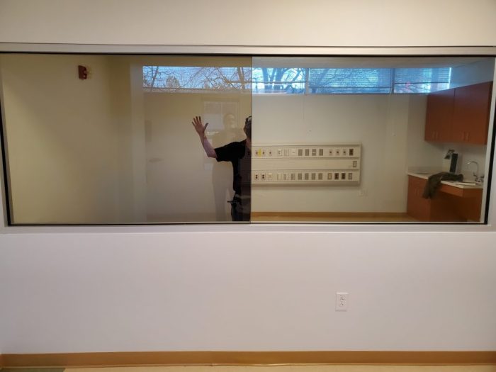 Two way glass mirror